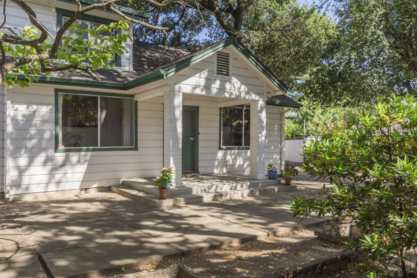 91 Marsh Road Atherton, CA 94027 - Photo 3 of 20 a front view of a house with a yard