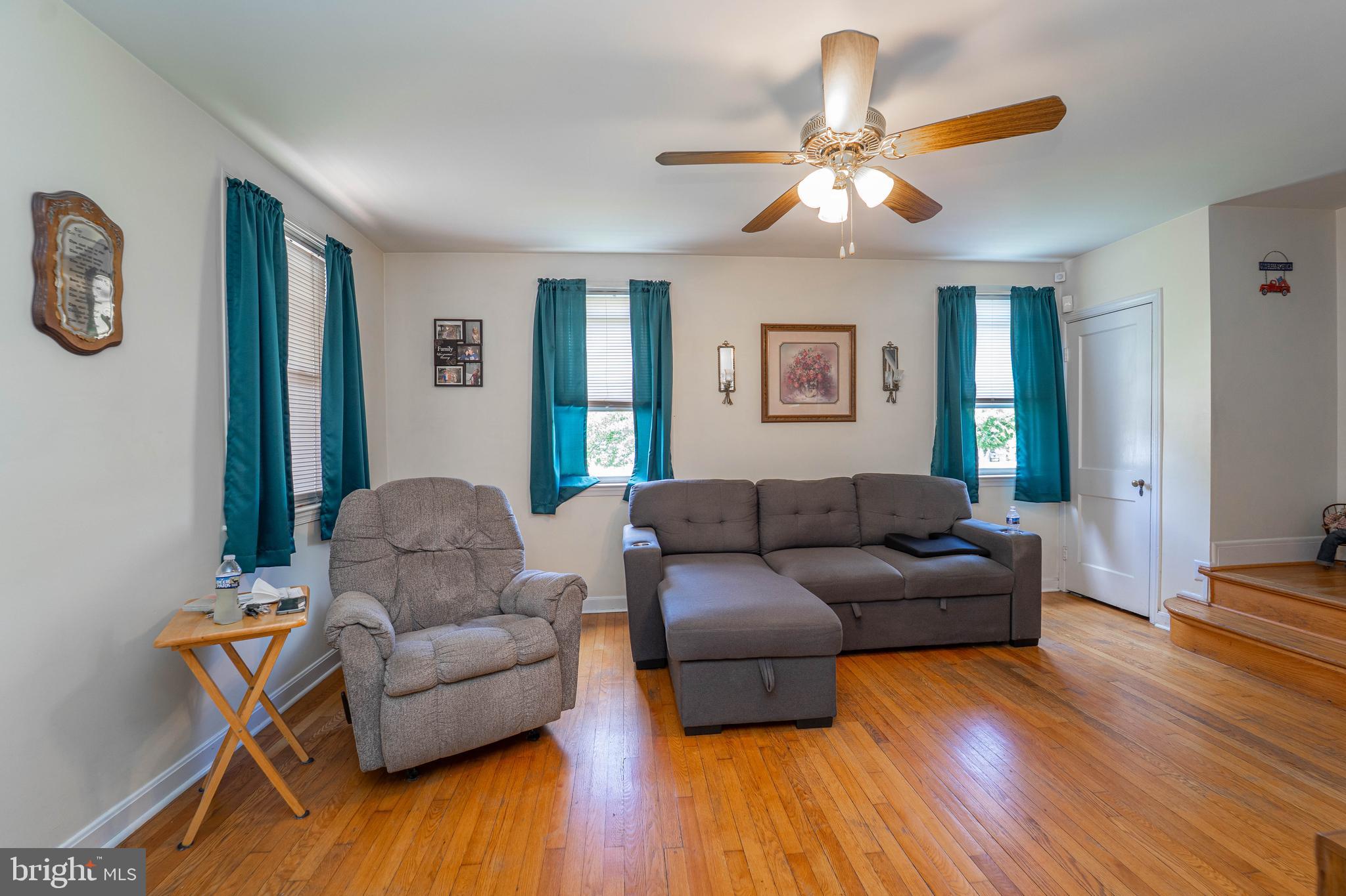 6515 Frederick Road Catonsville, MD 21228 - Photo 15 of 30 a living room with furniture and wooden floor