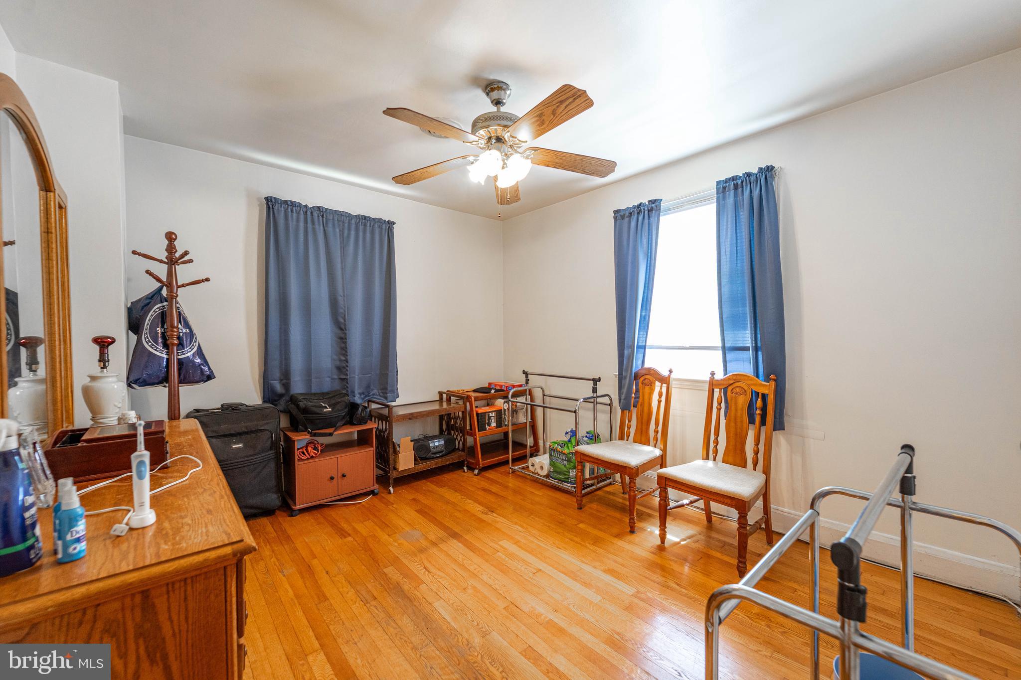 6515 Frederick Road Catonsville, MD 21228 - Photo 6 of 30 a living room with furniture and a flat screen tv