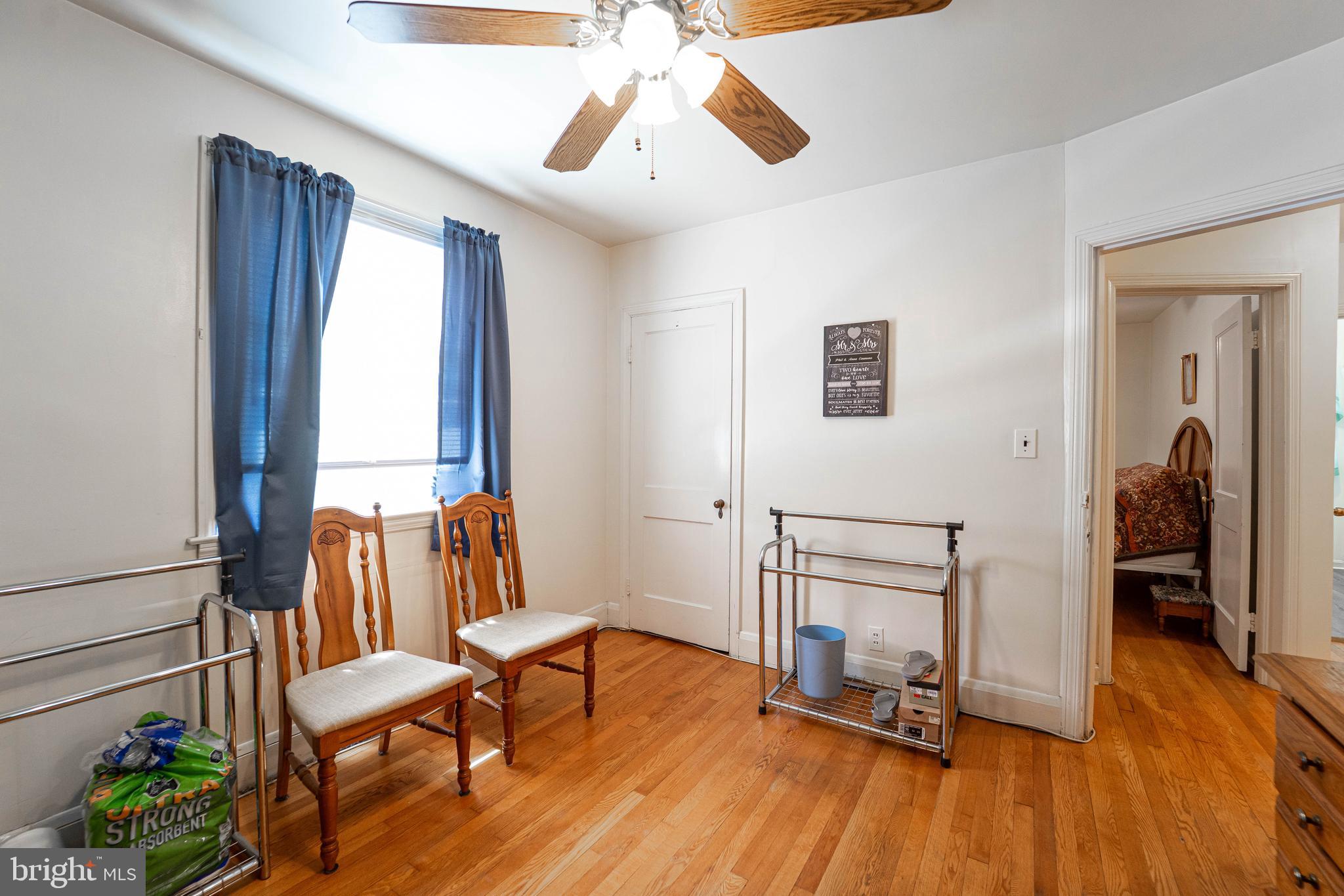 6515 Frederick Road Catonsville, MD 21228 - Photo 7 of 30 a view of a room with furniture and wooden floor