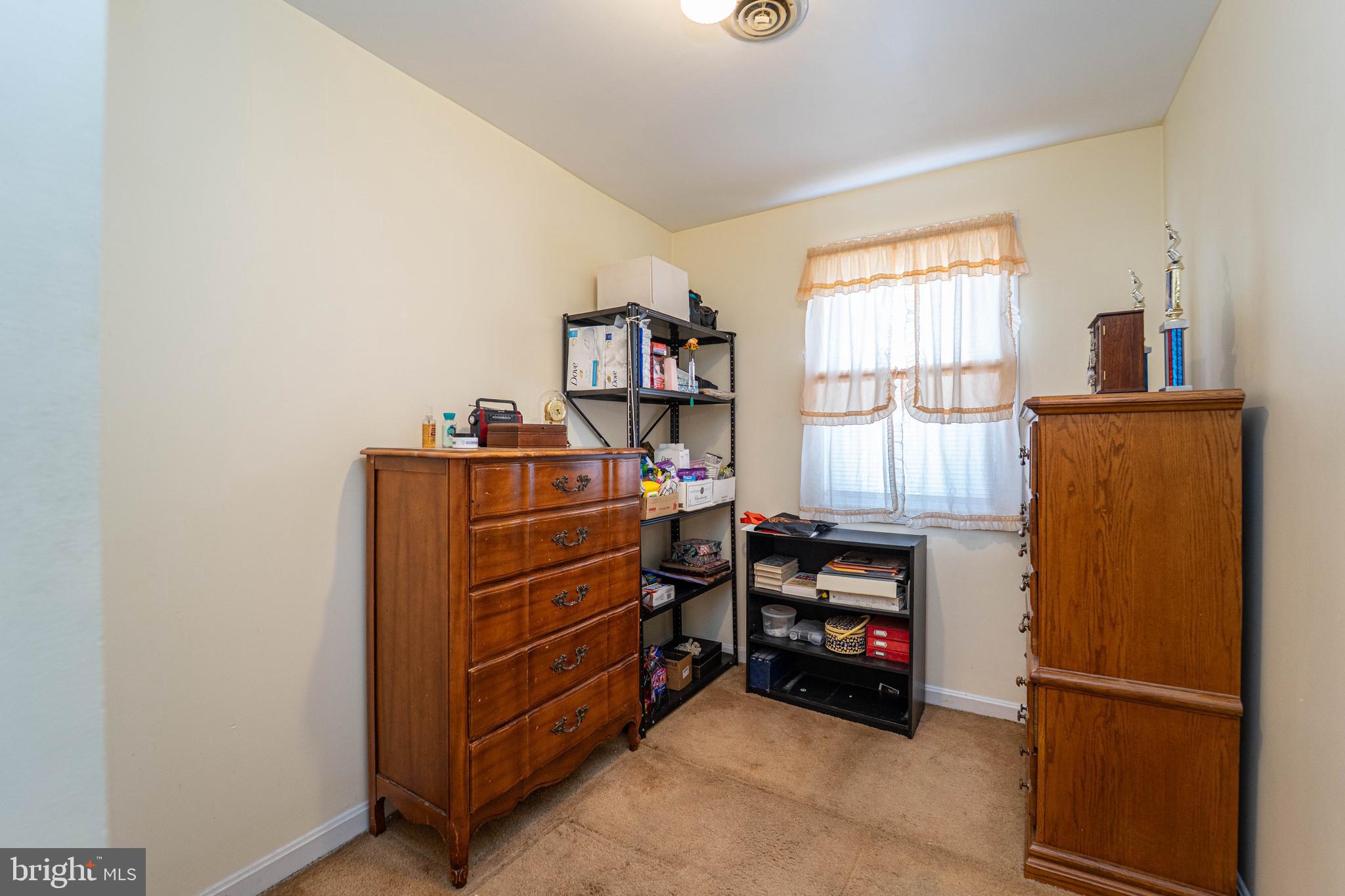 6515 Frederick Road Catonsville, MD 21228 - Photo 8 of 30 a room with storage and utility