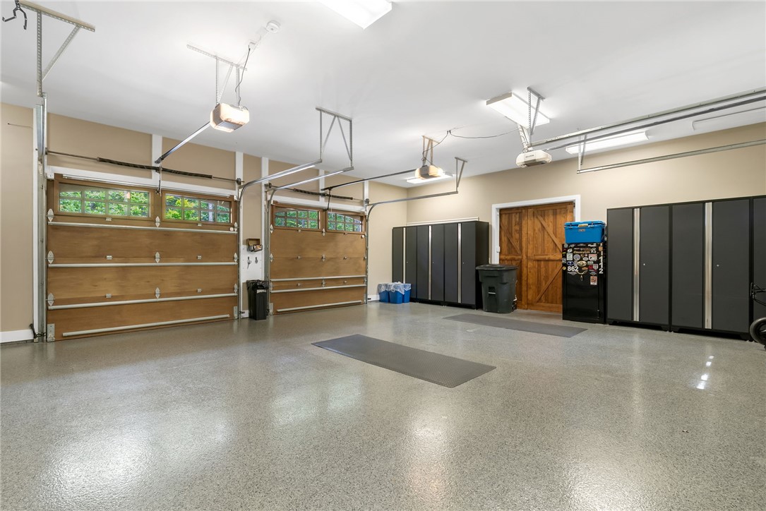 119 Drewberry Lane Sunset, SC 29685 - Photo 33 of 42 This spacious garage features a durable, easy-to-maintain floor, perfect for vehicles and hobbies.