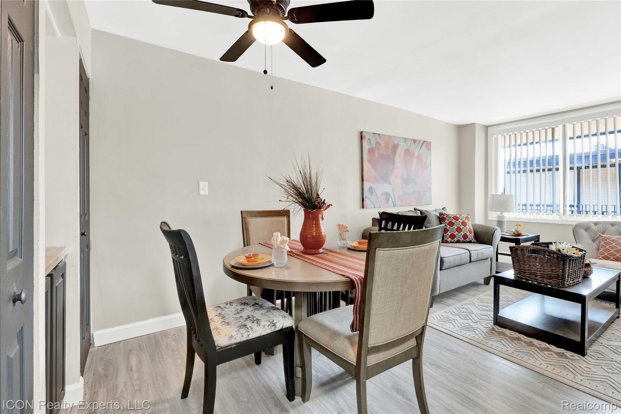 18400 Lahser Road Detroit, MI 48219 - Photo 5 of 22 Dining space featuring light wood-style flooring and a ceiling fan