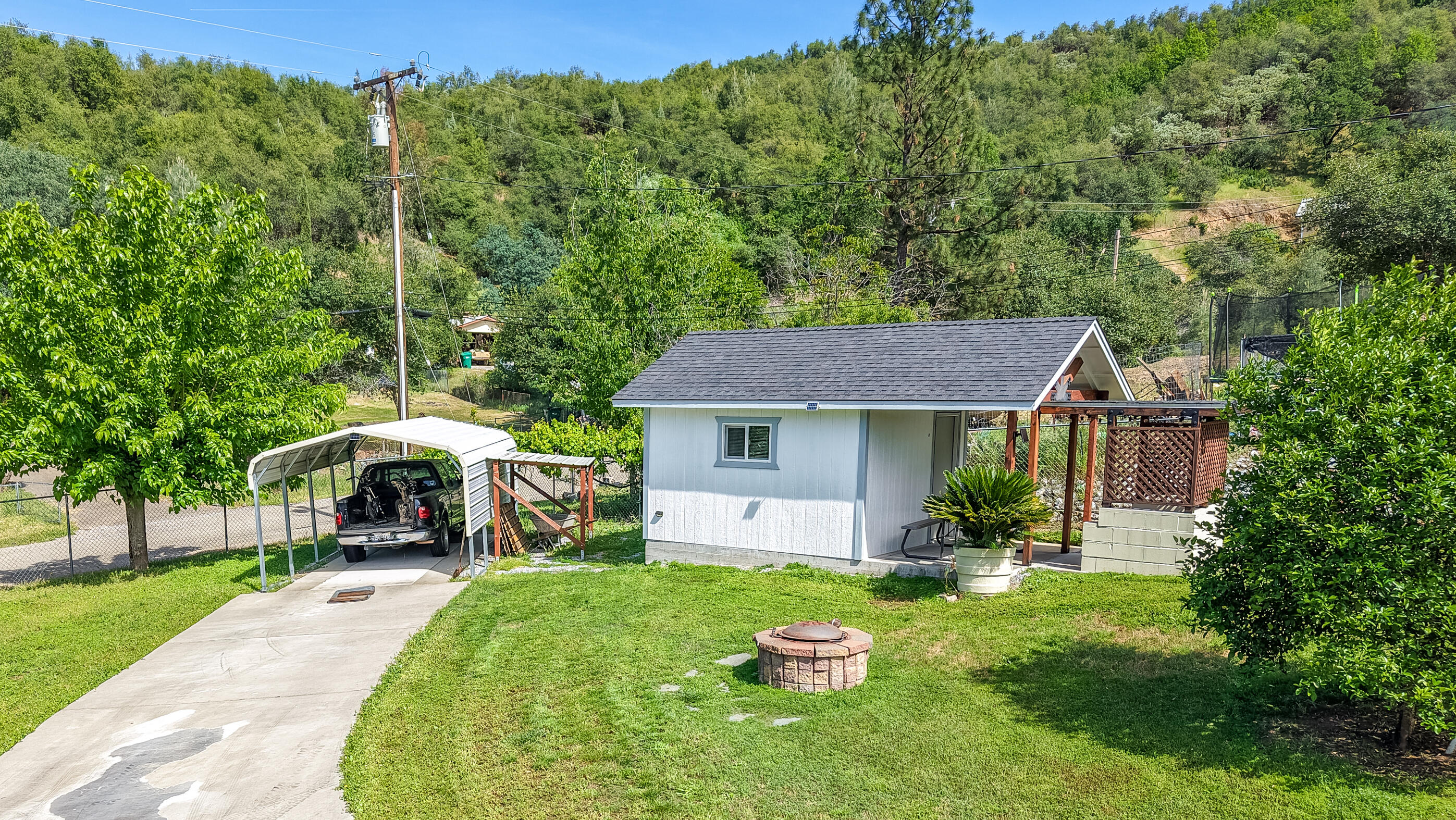 22151 Ravine Court Redding, CA 96003 - Photo 24 of 34 a view of a house with a yard