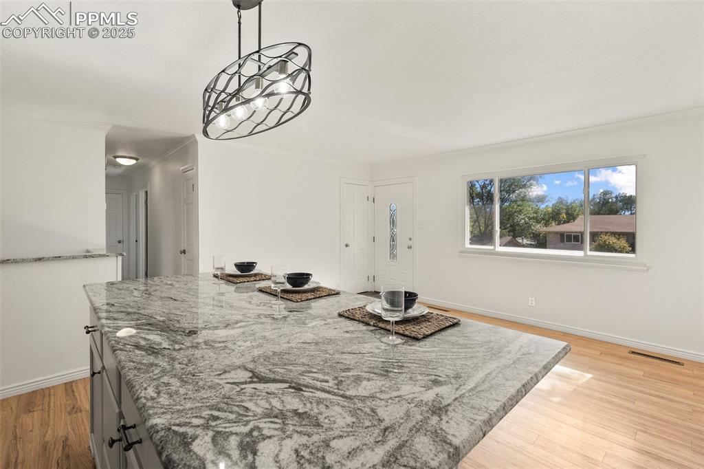 2518 Royalty Court Colorado Springs, CO 80904 - Photo 17 of 47 a view of a livingroom with furniture nad wooden floor