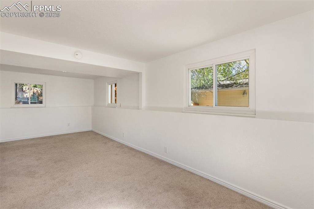 2518 Royalty Court Colorado Springs, CO 80904 - Photo 27 of 47 an empty room with a window