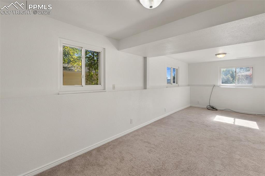 2518 Royalty Court Colorado Springs, CO 80904 - Photo 28 of 47 an empty room with windows