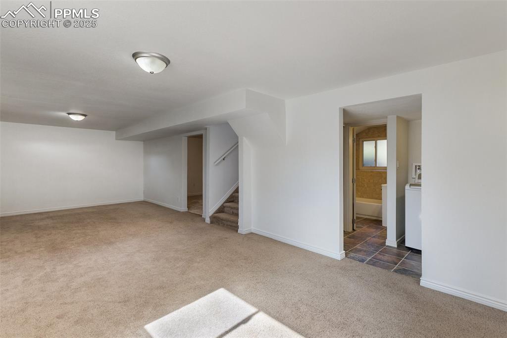 2518 Royalty Court Colorado Springs, CO 80904 - Photo 30 of 47 an empty room with an entryway
