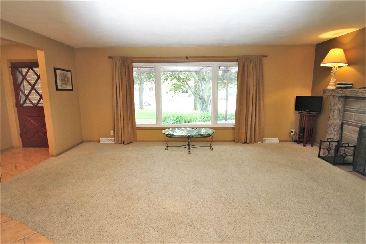 4118 Landstrom Road Rockford, IL 61114 - Photo 14 of 24 a view of a livingroom with a furniture and a window