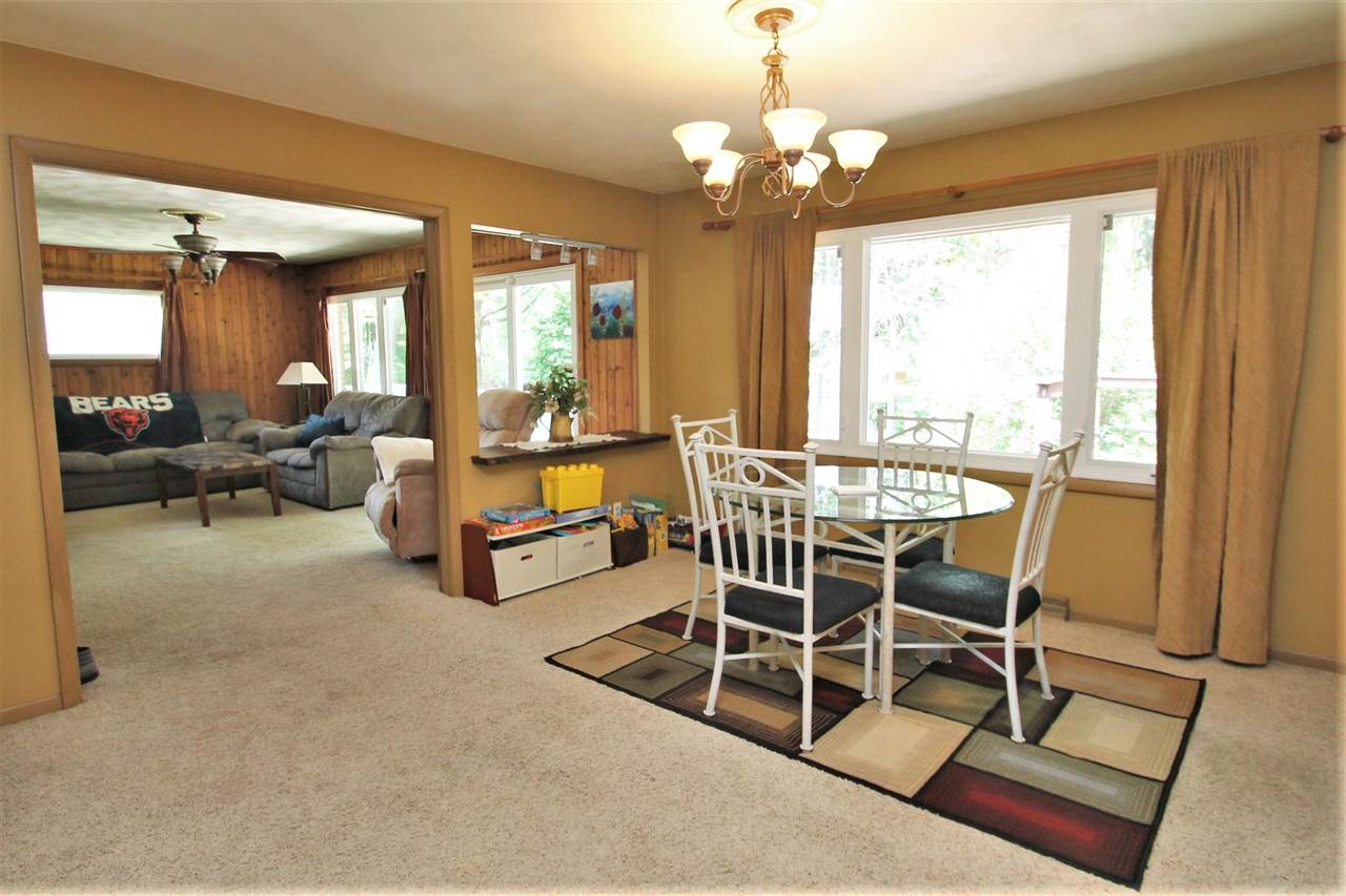 4118 Landstrom Road Rockford, IL 61114 - Photo 15 of 24 a living room with furniture and a large window