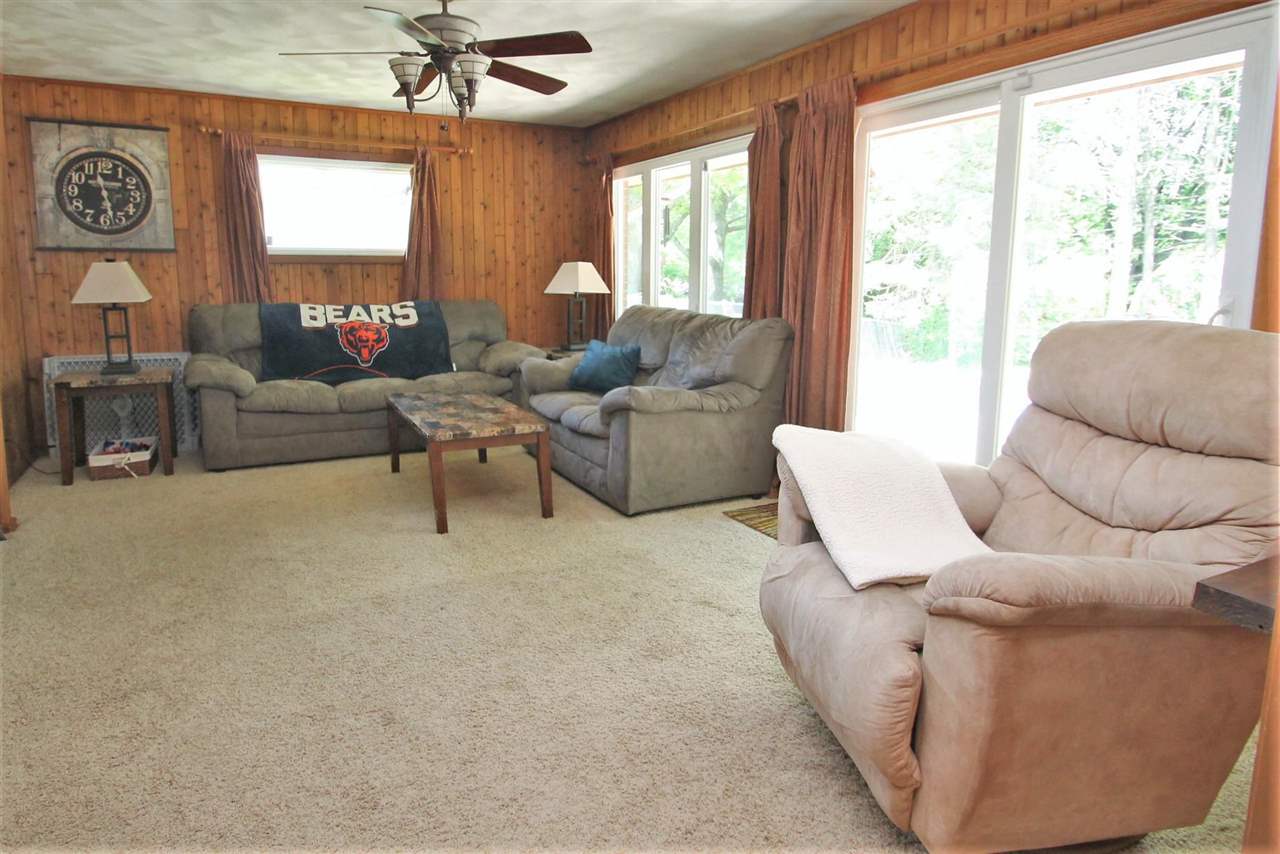 4118 Landstrom Road Rockford, IL 61114 - Photo 18 of 24 a living room with furniture and a large window