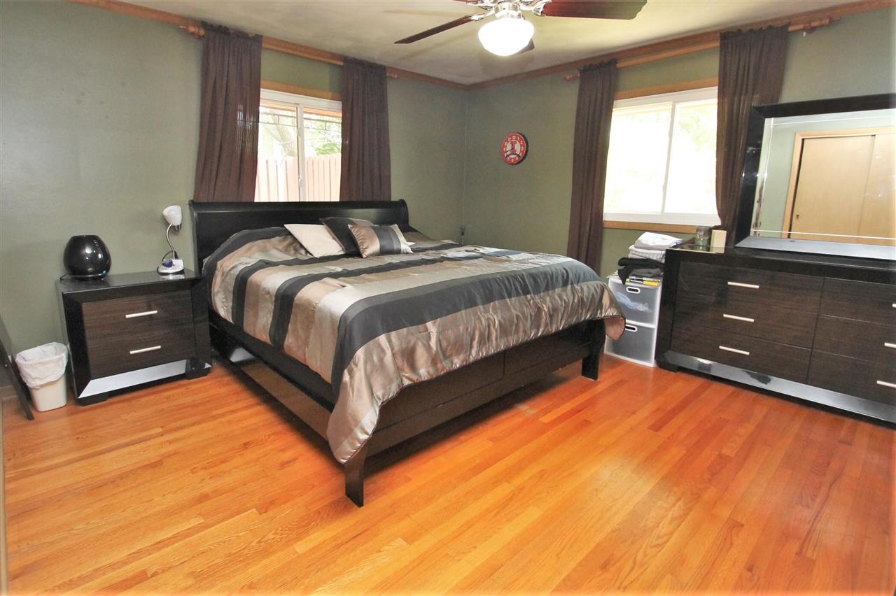 4118 Landstrom Road Rockford, IL 61114 - Photo 19 of 24 a bedroom with a bed and a dresser