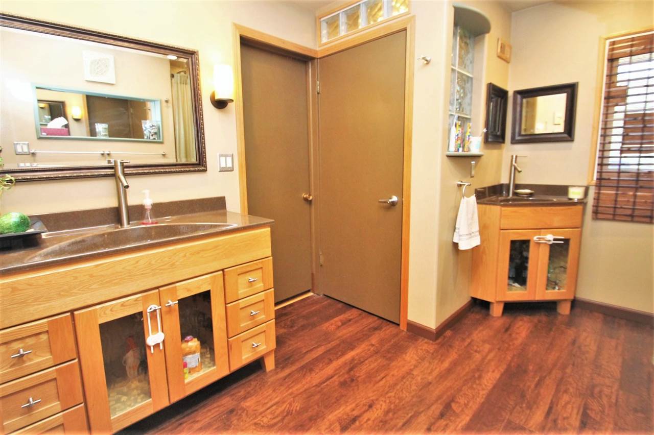 4118 Landstrom Road Rockford, IL 61114 - Photo 20 of 24 a kitchen with stainless steel appliances granite countertop a refrigerator a stove and a wooden floor