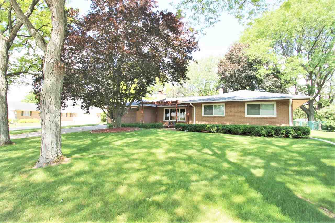 4118 Landstrom Road Rockford, IL 61114 - Photo 2 of 24 a view of a house with backyard and a tree