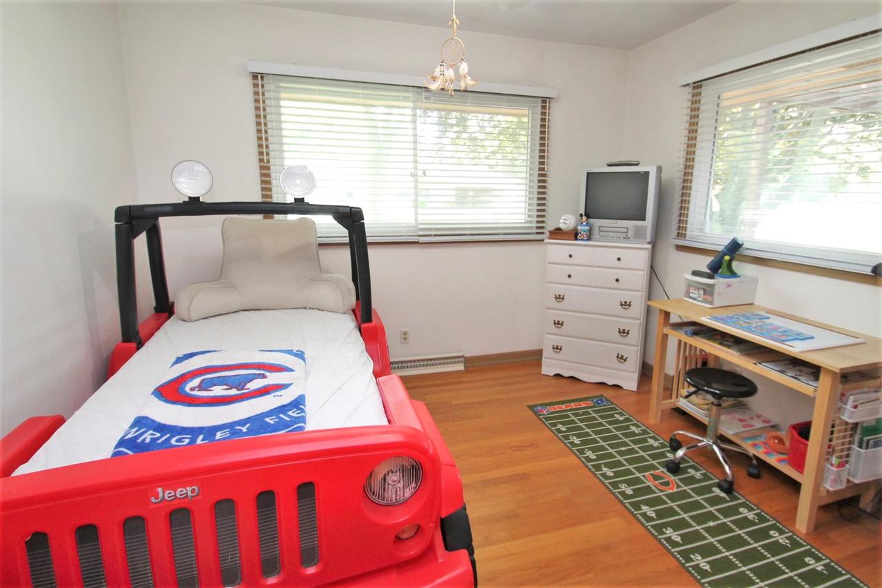 4118 Landstrom Road Rockford, IL 61114 - Photo 21 of 24 a bedroom with a bed and a window