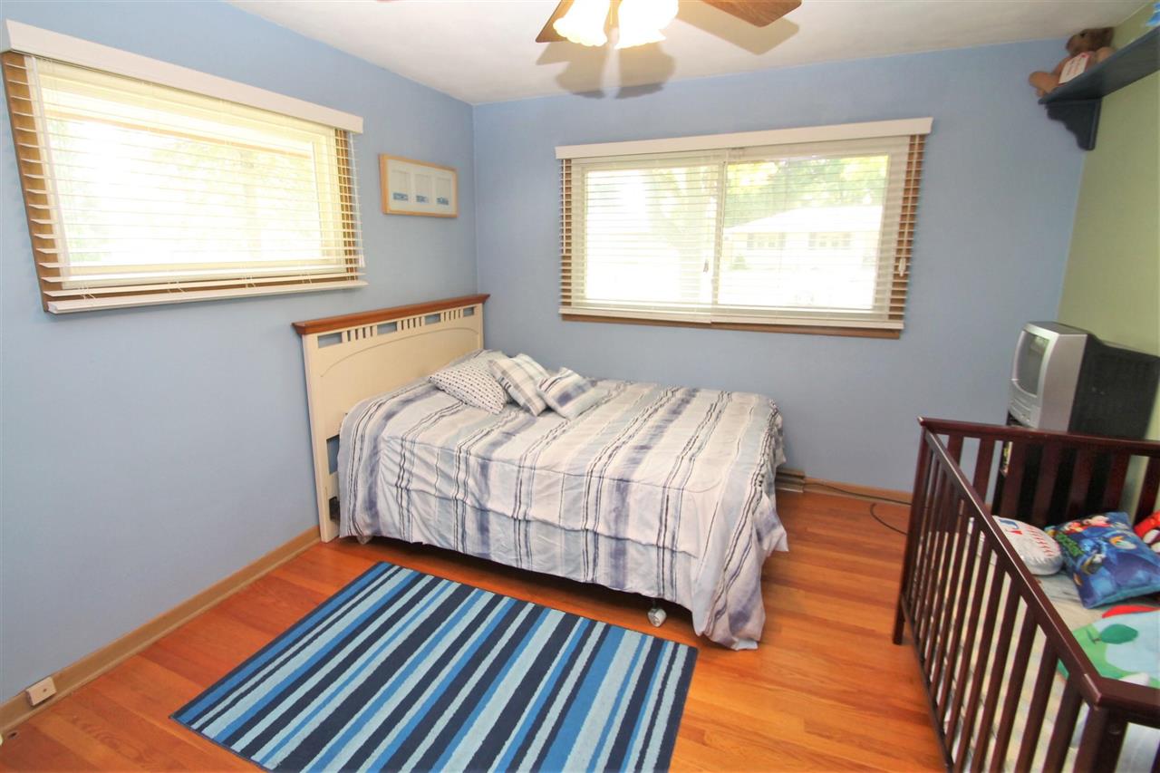 4118 Landstrom Road Rockford, IL 61114 - Photo 23 of 24 a bedroom with bed and a window