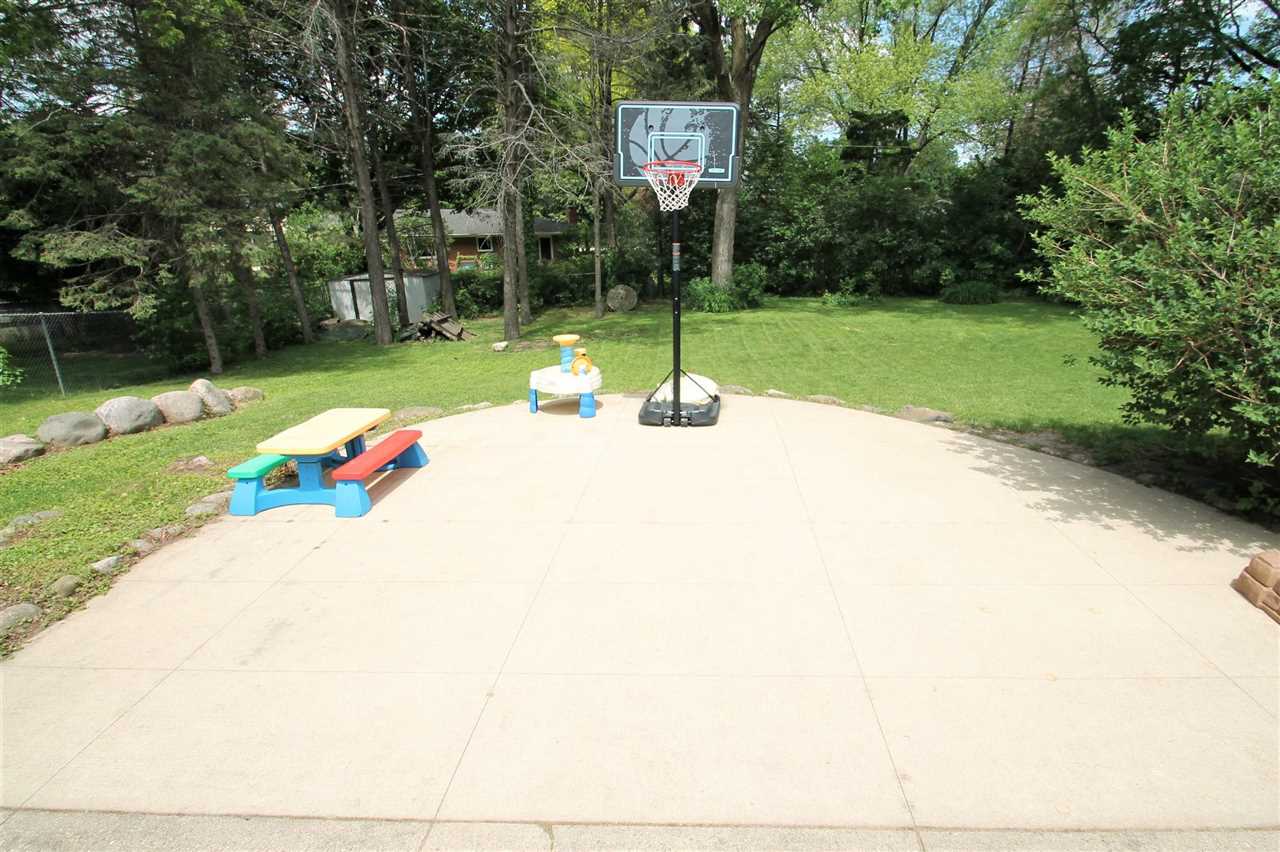 4118 Landstrom Road Rockford, IL 61114 - Photo 6 of 24 a childrens park with lots of trees