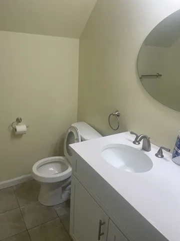 a bathroom with a sink and a toilet