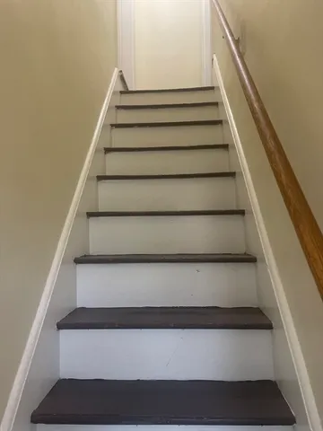 a bathroom with a sink a mirror and a toilet