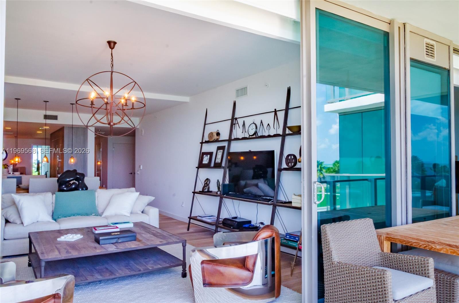 350 Ocean Drive, Unit 406N Key Biscayne, FL 33149 - Photo 21 of 41 a living room with furniture a window and wood floor