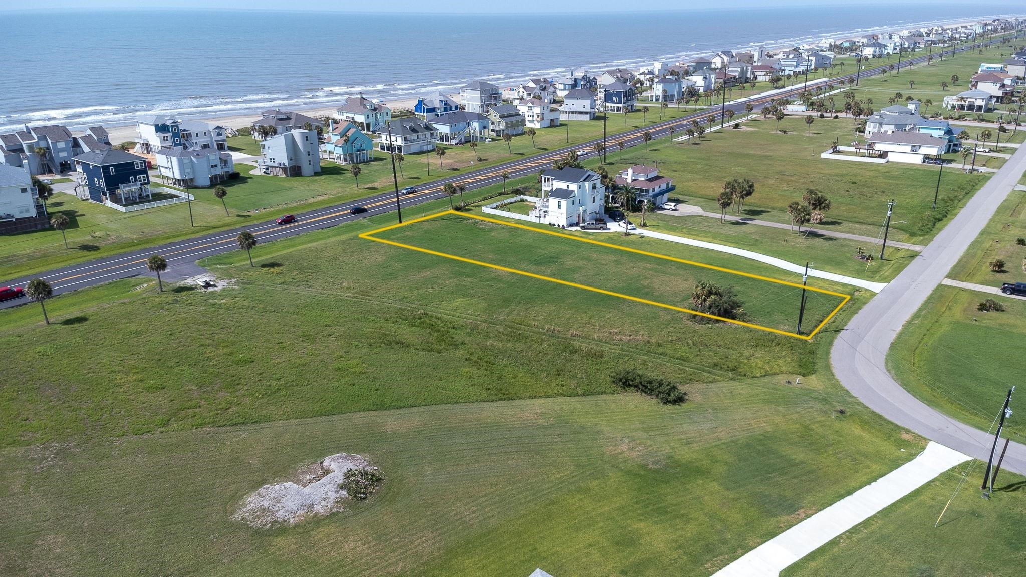 18223 Shaman Road Galveston, TX 77554 - Photo 3 of 6 an aerial view of a pool