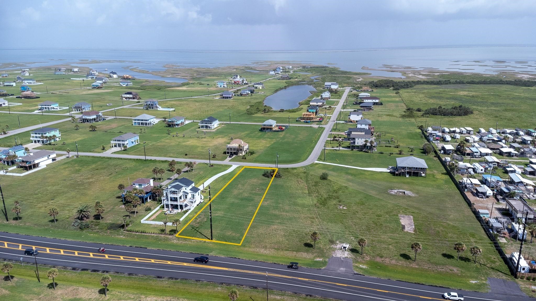 18223 Shaman Road Galveston, TX 77554 - Photo 6 of 6 an aerial view of a football ground