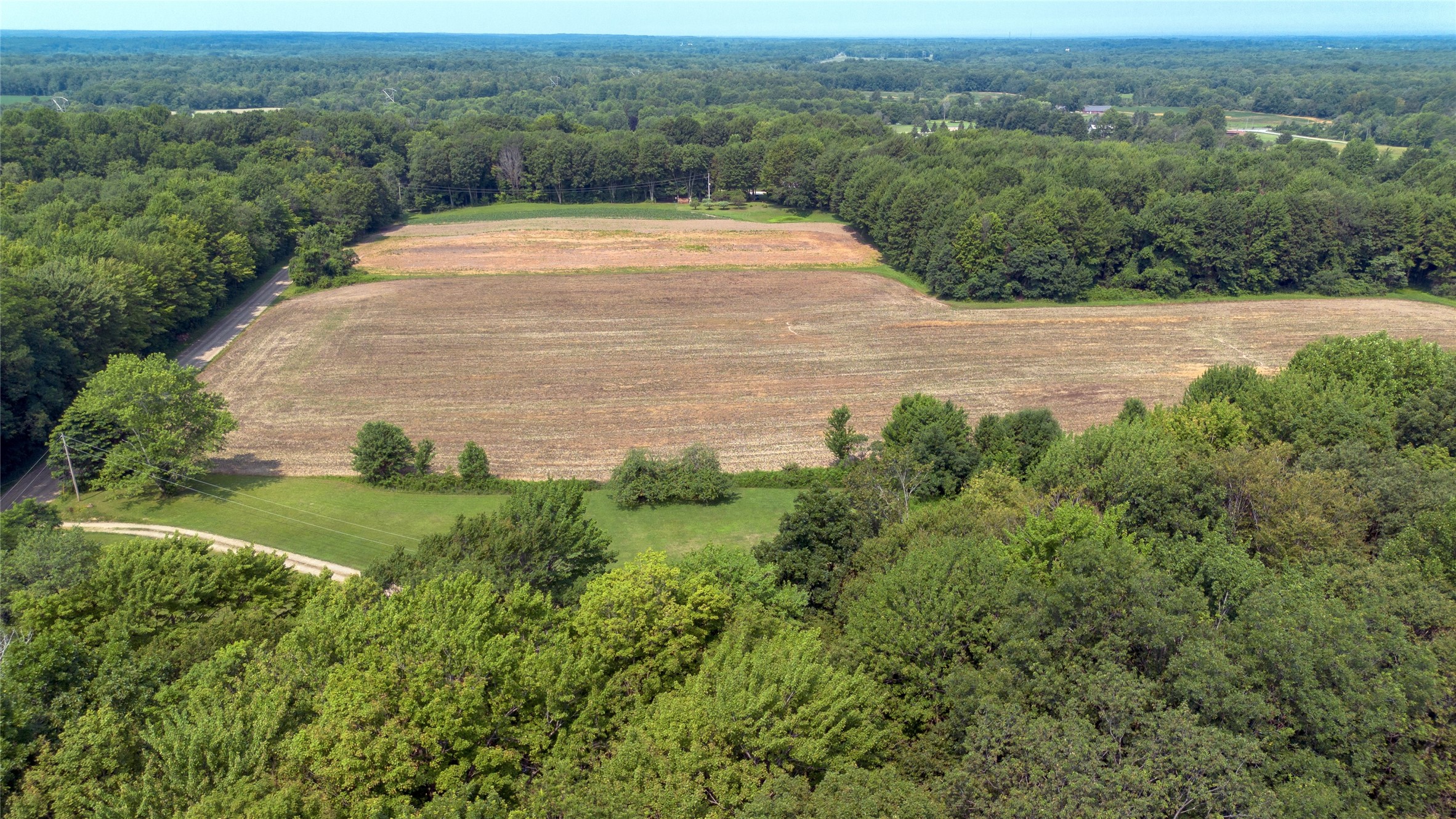 Richardson Road Cranesville, PA 16410 - Photo 14 of 15 an aerial view of a house with a yard