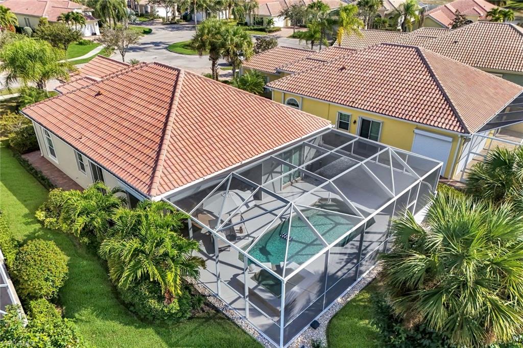 7063 Toscana Court Naples, FL 34114 - Photo 40 of 47 Aerial perspective of suburban area