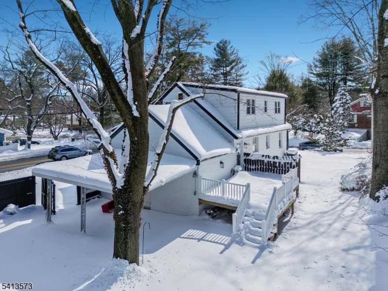 252 Knickerbocker Road Closter, NJ 07624 - Photo 23 of 27 a view of house with outdoor seating and city view