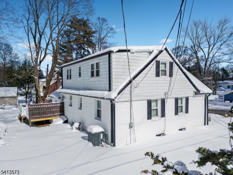 252 Knickerbocker Road Closter, NJ 07624 - Photo 26 of 27 a white house that has tree in front of it