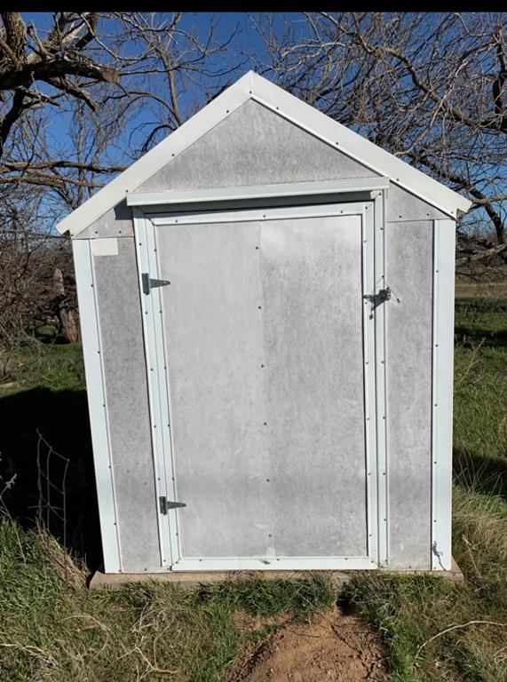 7 Barry Road Henrietta, TX 76365 - Photo 4 of 7 a bathroom with a shower