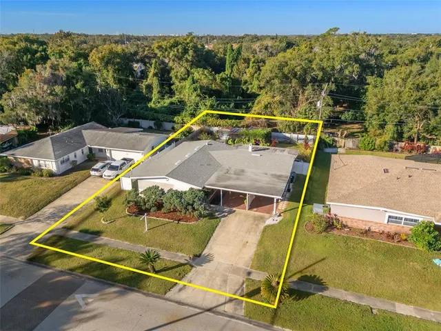 a view of a swimming pool with a chairs