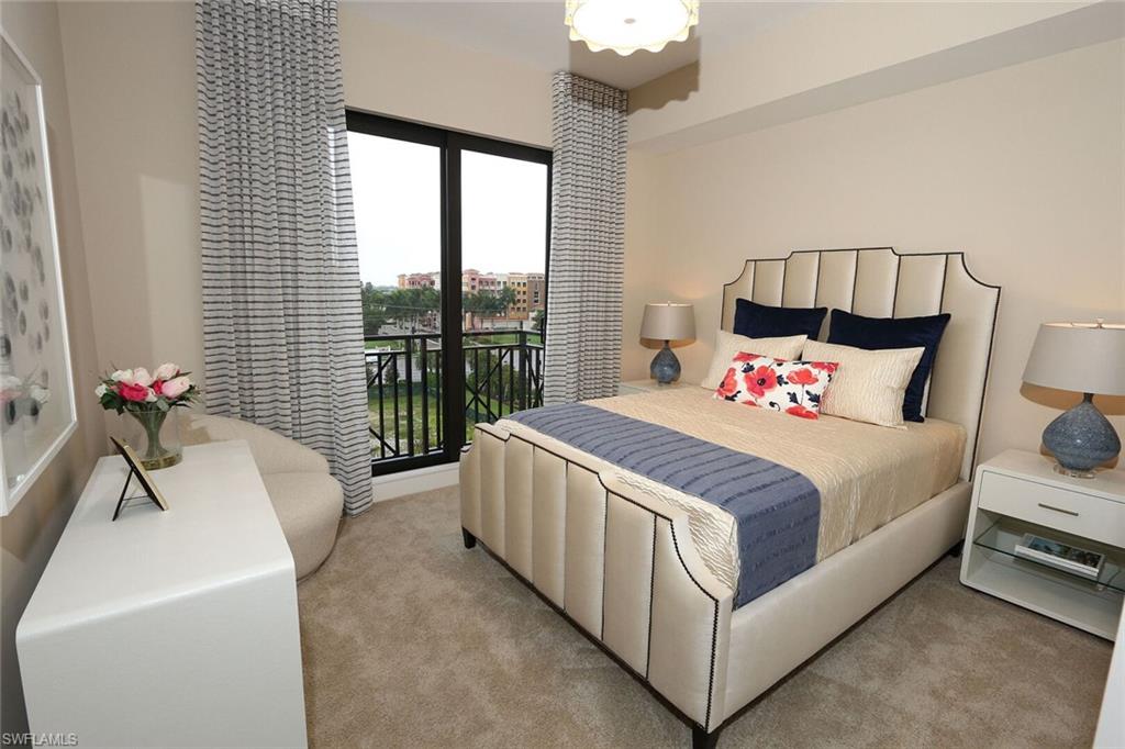 1135 3rd Avenue South, Unit 517 Naples, FL 34102 - Photo 19 of 35 a spacious bedroom with a bed and a window