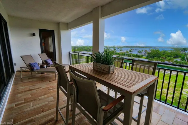 a view of an outside dining space with furniture