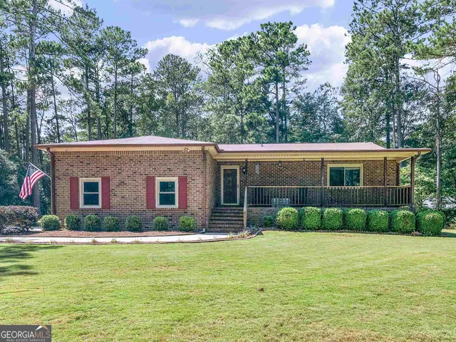 a house view with a garden space