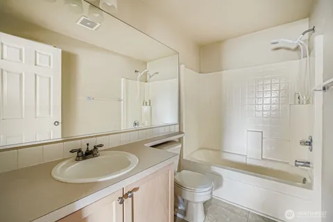 a view of a backyard with a small cabin