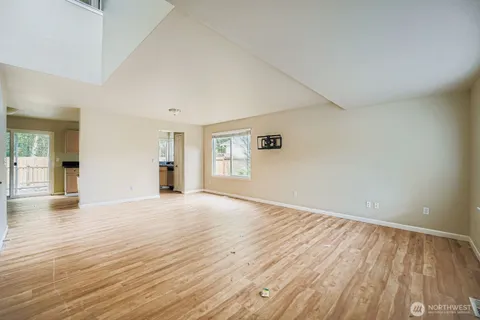 a kitchen with stainless steel appliances granite countertop a stove a sink and a granite counter tops