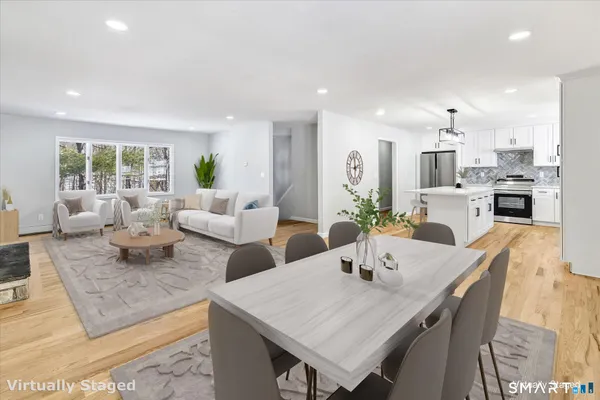 a view of a dining room with furniture