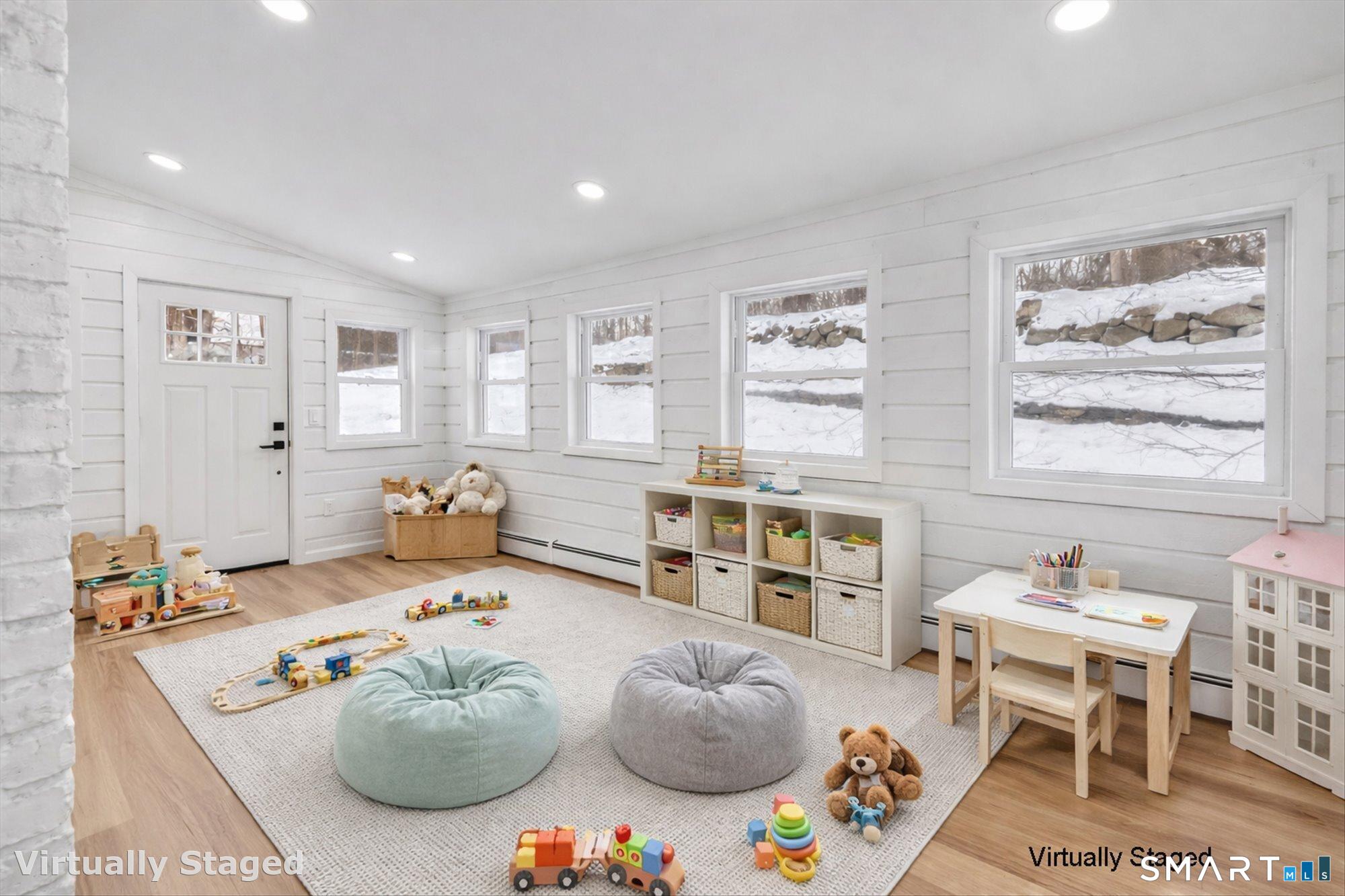 176 Strobel Road Trumbull, CT 06611 - Photo 15 of 39 a bedroom with furniture and a large window