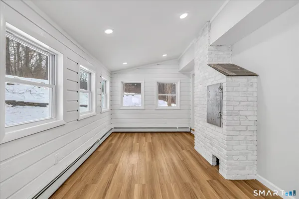 a view of wooden floor in a bathroom