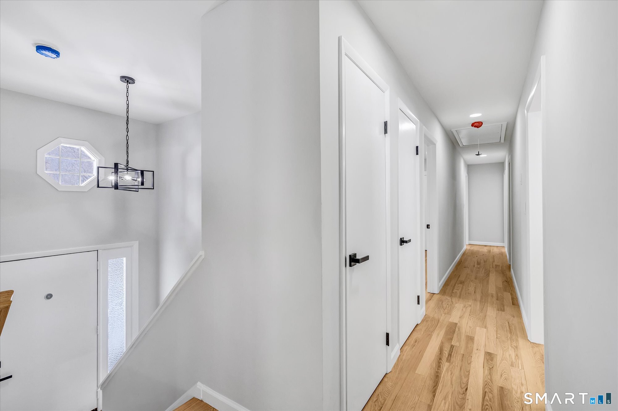 176 Strobel Road Trumbull, CT 06611 - Photo 19 of 39 a view of a hallway view with staircase