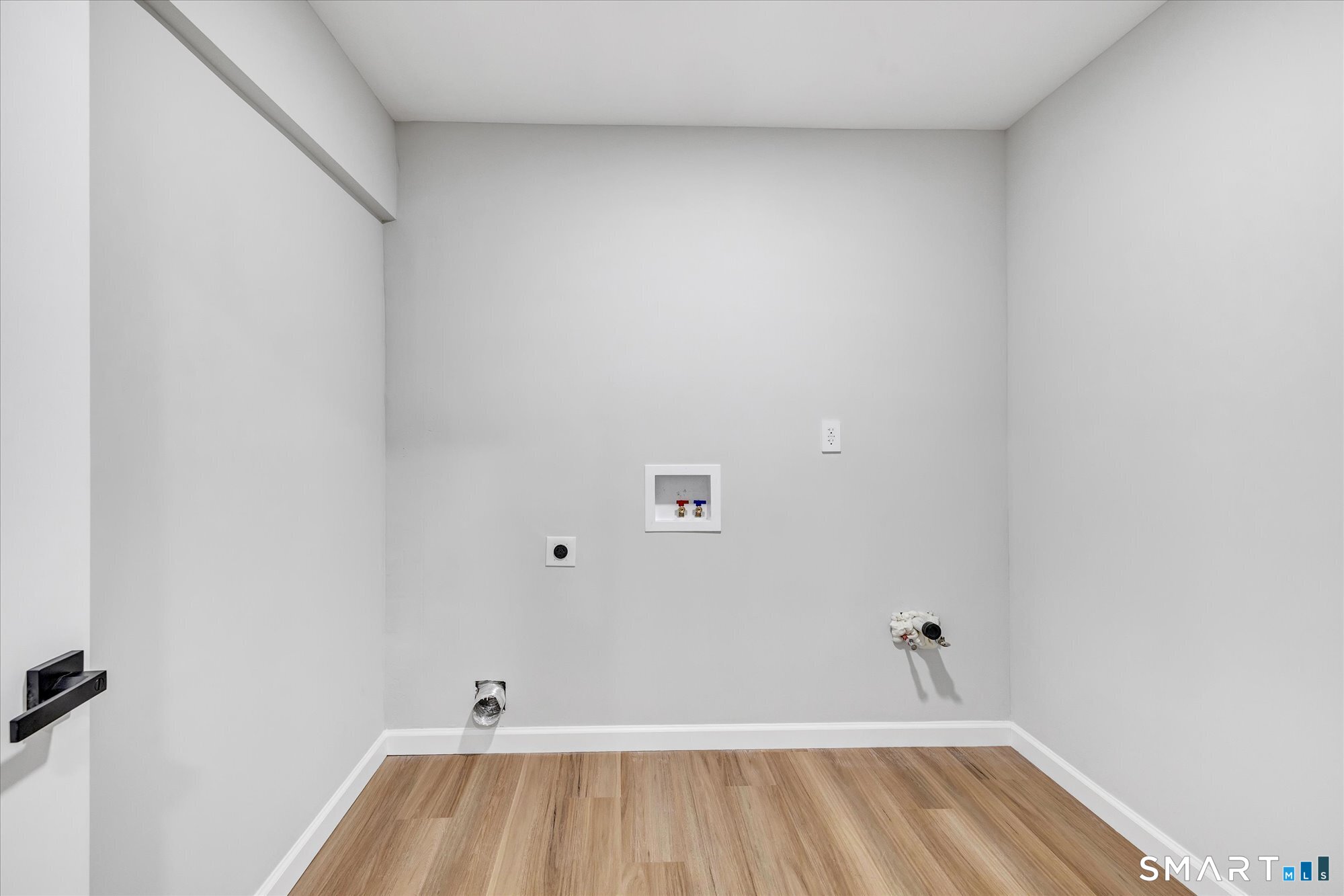 176 Strobel Road Trumbull, CT 06611 - Photo 36 of 39 a view of room with wooden floor