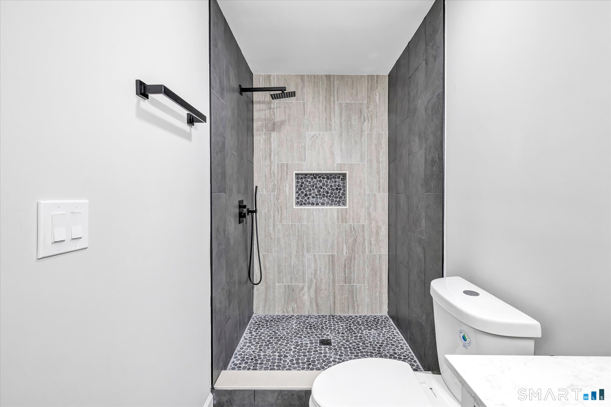 176 Strobel Road Trumbull, CT 06611 - Photo 38 of 39 a bathroom with a toilet a sink and shower