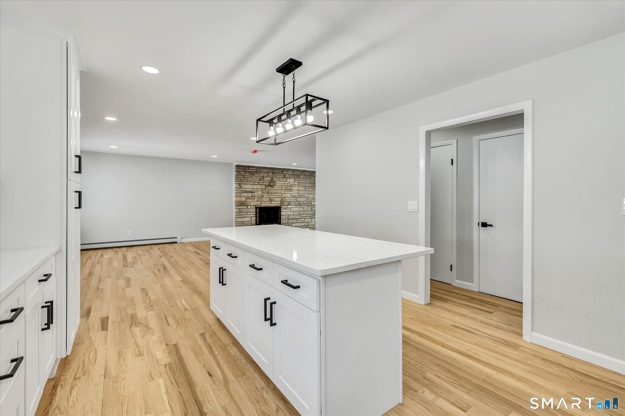 176 Strobel Road Trumbull, CT 06611 - Photo 6 of 39 a very nice looking room with wooden floor