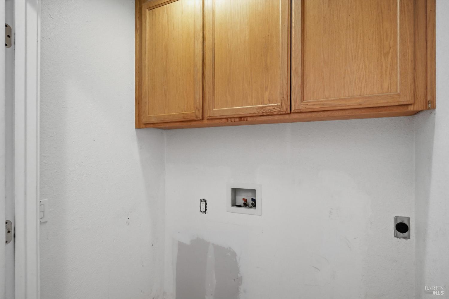 18057 Spyglass Road Hidden Valley Lake, CA 95467 - Photo 17 of 29 Laundry closet off kitchen.