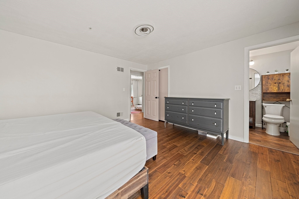 50 Badger Road Framingham, MA 01702 - Photo 18 of 41 a room with a bed and a dresser