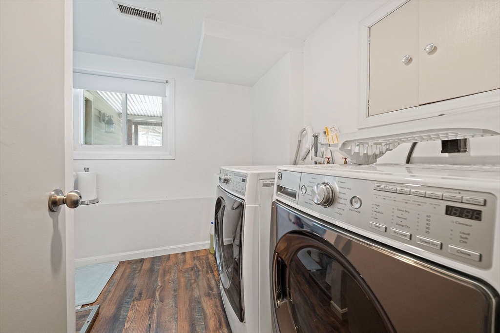 50 Badger Road Framingham, MA 01702 - Photo 25 of 41 a utility room with dryer and washer