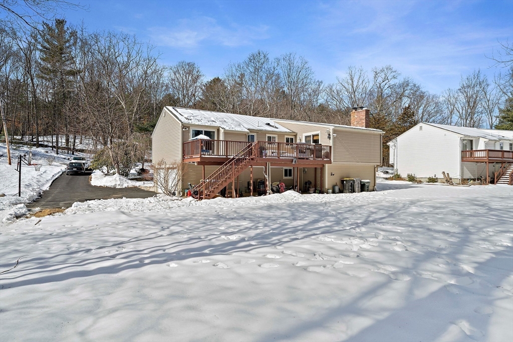 50 Badger Road Framingham, MA 01702 - Photo 32 of 41 a view of a house with snow on the road