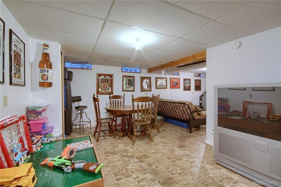 24683 Pheasant Run Road Flat Rock, MI 48134 - Photo 25 of 30 25-Finished Lower Level 2nd View.jpg