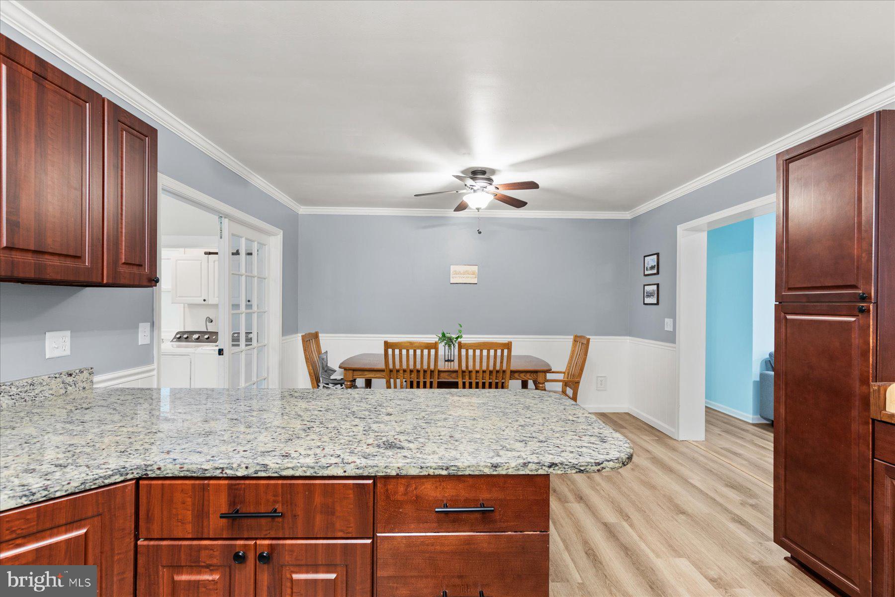 4 Poacher Berlin, MD 21811 - Photo 16 of 45 a kitchen with granite countertop cabinets and refrigerator